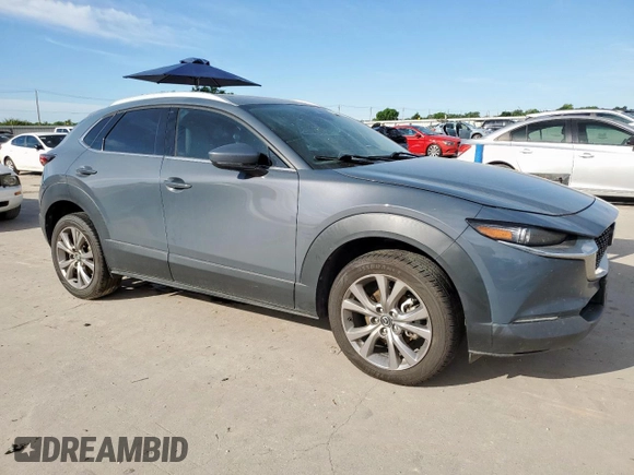 2020 Mazda CX-30 Premium with VIN 3MVDMAEMXLM125319, listed as a Copart auction lot 57896985 with 117,692 mi miles and Salvage title. Bid and sale history available at DreamBid. Image 4.