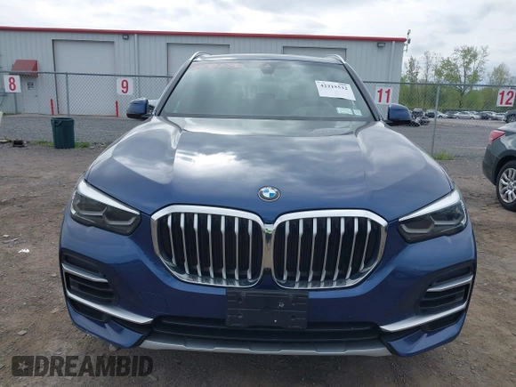 2022 BMW X5 xDrive40i z VIN 5UXCR6C08N9J99866, wystawiony jako IAAI lot #42215532 z przebiegiem 53 484 mil mil oraz . Historia ofert i sprzedaży dostępna na DreamBid. Obrazek 12.