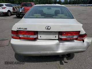 2000 Lexus ES 300 with VIN JT8BF28G6Y5099537, listed as a Copart auction lot 61873595 with 167,090 mi miles and Salvage title. Bid and sale history available at DreamBid. Image 6.