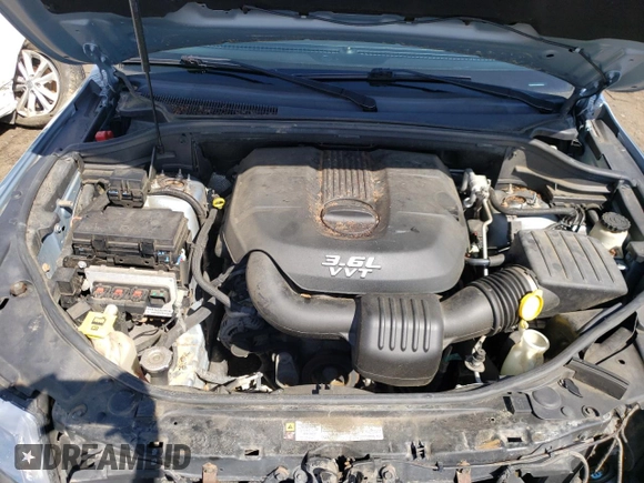 2012 Jeep Grand Cherokee Laredo with VIN 1C4RJFAG5CC222569, listed as a Copart auction lot 53264185 with 153,921 mi miles and Salvage Title. Bid and sale history available at carsss.com. Image 12.