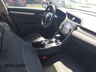 2020 Honda Civic LX z VIN 19XFC2F67LE001375, wystawiony jako IAAI lot #42033879 z przebiegiem 79 941 mil mil oraz . Historia ofert i sprzedaży dostępna na DreamBid. Obrazek 5.