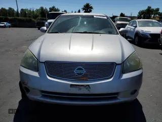 2006 Nissan Altima S with VIN 1N4AL11D16N301591, listed as a Copart auction lot 58568625 with 169,290 mi miles and Salvage title. Bid and sale history available at DreamBid. Image 5.