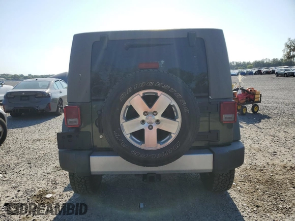 2008 Jeep Wrangler Unlimited Sahara with VIN 1J4GA59138L616722, listed as a Copart auction lot 54162835 with Not Provided miles and Salvage Title. Bid and sale history available at DreamBid. Image 6.