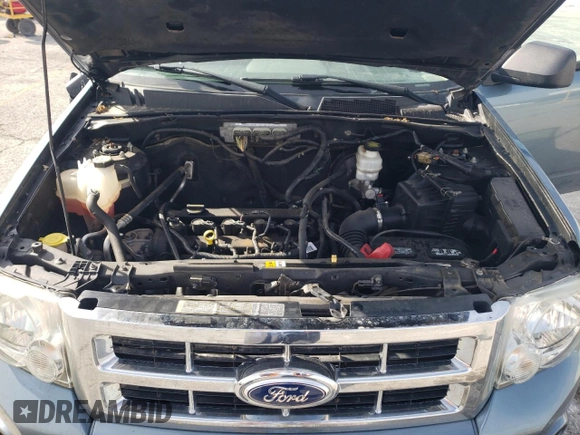 2012 Ford Escape XLT z VIN 1FMCU0D71CKA38530, wystawiony jako Copart lot #54211035 z przebiegiem 136 193 mil mil oraz Szkoda całkowita • Salvage title. Historia ofert i sprzedaży dostępna na DreamBid. Obrazek 12.