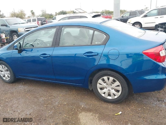 2012 Honda Civic Sdn LX with VIN 2HGFB2F50CH582539, listed as a IAAI auction lot 41296020 with 65,334 mi miles. Bid and sale history available at carsss.com. Image 15.