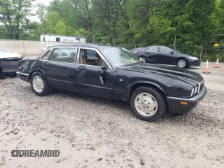 1997 Jaguar XJ with VIN SAJHX6248VC806189, listed as a Copart auction lot 57891035 with 51,654 mi miles and Salvage title. Bid and sale history available at DreamBid. Image 4.