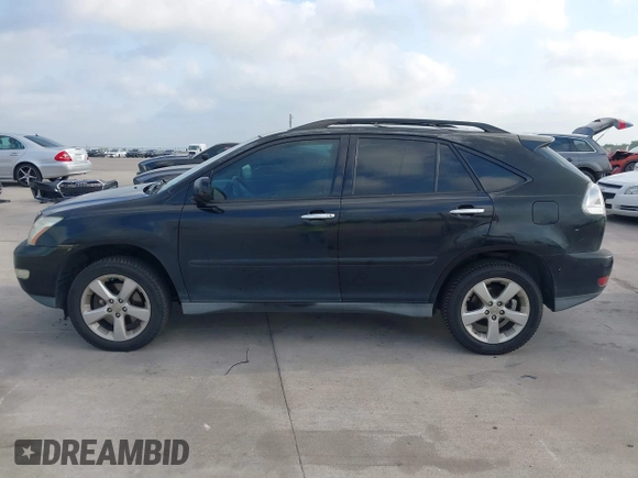 2008 Lexus RX with VIN 2T2HK31U38C064322, listed as a IAAI auction lot 42074366 with 241,459 mi miles. Bid and sale history available at carsss.com. Image 14.