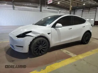 2022 Tesla Model Y Performance with VIN 7SAYGDEF7NF520825, listed as a Copart auction lot 57400245 with 55,437 mi miles and Salvage title. Bid and sale history available at DreamBid. Image 1.