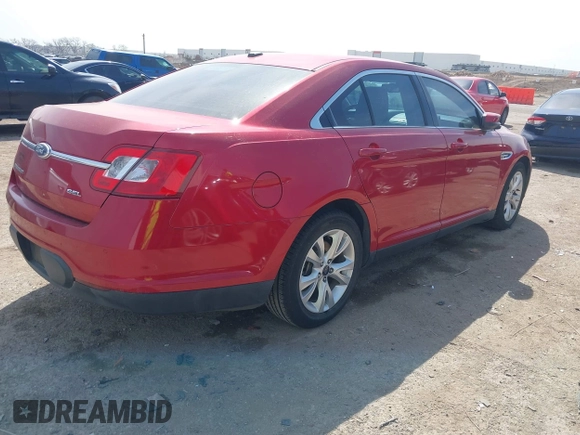 2011 Ford Taurus SEL z VIN 1FAHP2EW7BG123740, wystawiony jako IAAI lot #41890761 z przebiegiem 132 310 mil mil oraz . Historia ofert i sprzedaży dostępna na DreamBid. Obrazek 4.