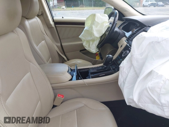 2015 Ford Taurus Limited with VIN 1FAHP2F89FG182598, listed as a IAAI auction lot 42222372 with 124,627 mi miles and . Bid and sale history available at DreamBid. Image 5.