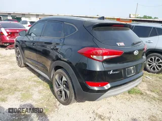 2018 Hyundai Tucson Sport z VIN KM8J33AL5JU741563, wystawiony jako IAAI lot #41928357 z przebiegiem 97 004 mil mil oraz . Historia ofert i sprzedaży dostępna na DreamBid. Obrazek 3.