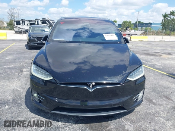 2017 Tesla Model X 90D with VIN 5YJXCBE21HF054898, listed as a IAAI auction lot 42076462 with 89,996 mi miles and . Bid and sale history available at DreamBid. Image 6.