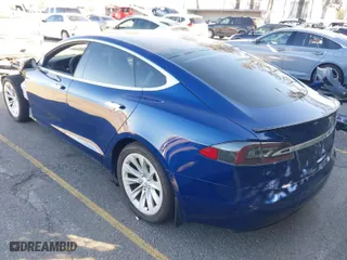 2019 Tesla Model S 75D with VIN 5YJSA1E27KF333645, listed as a IAAI auction lot 41647989 with 52,528 mi miles. Bid and sale history available at carsss.com. Image 3.