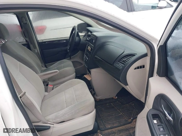 2012 Dodge Grand Caravan SE with VIN 2C4RDGBG2CR419489, listed as a IAAI auction lot 41270114 with 124,869 mi miles. Bid and sale history available at carsss.com. Image 5.