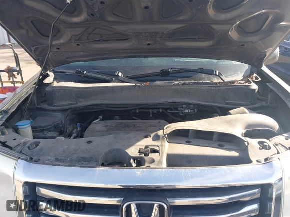 2013 Honda Pilot Touring with VIN 5FNYF4H94DB035692, listed as a IAAI auction lot 41771116 with 137,464 mi miles and . Bid and sale history available at carsss.com. Image 10.