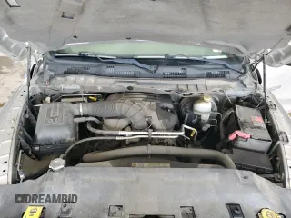 2012 Ram 1500 Tradesman z VIN 3C6JD7DT4CG110093, wystawiony jako Copart lot #53642215 z przebiegiem 110 996 mil mil oraz Szkoda całkowita • Salvage title. Historia ofert i sprzedaży dostępna na DreamBid. Obrazek 11.