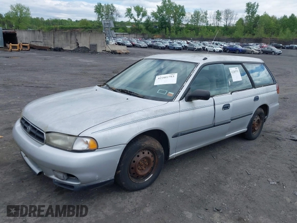 1998 Subaru Legacy L z VIN 4S3BK4353W7300794, wystawiony jako IAAI lot #42205793 z przebiegiem 227 539 mil mil oraz . Historia ofert i sprzedaży dostępna na DreamBid. Obrazek 2.