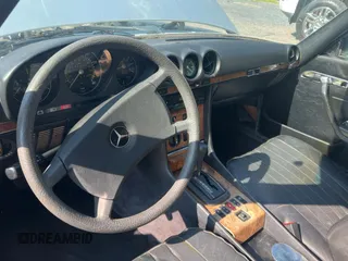 1984 Mercedes-Benz SL with VIN WDB1070421A009542, listed as a Copart auction lot 65327125 with 142,656 mi miles and Clean title. Bid and sale history available at DreamBid. Image 9.