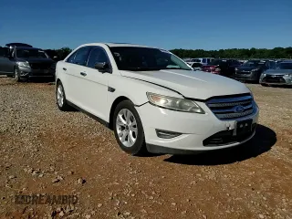 2011 Ford Taurus SEL z VIN 1FAHP2EW2BG188513, wystawiony jako Copart lot #58017755 z przebiegiem 211 530 mil mil oraz Szkoda całkowita • Salvage title. Historia ofert i sprzedaży dostępna na DreamBid. Obrazek 13.