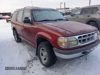 1996 Ford Explorer XL z VIN 1FMDU34X5TUA10188, wystawiony jako Copart lot #80354054 z przebiegiem 119 193 mil mil oraz Szkoda całkowita • Salvage title. Historia ofert i sprzedaży dostępna na DreamBid. Obrazek 10.