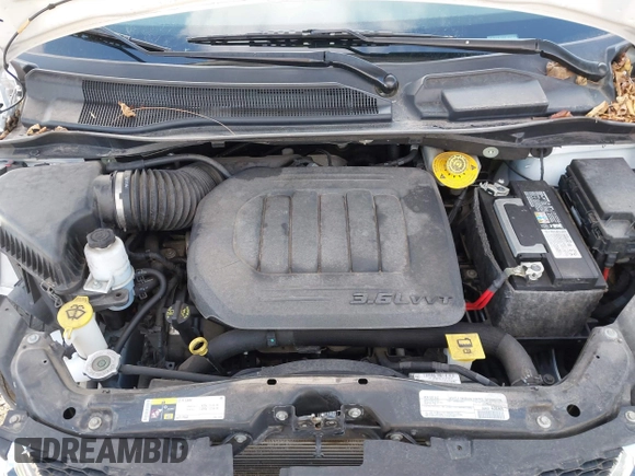 2019 Dodge Grand Caravan SXT with VIN 2C4RDGCG4KR771745, listed as a IAAI auction lot 41859267 with 97,436 mi miles and . Bid and sale history available at DreamBid. Image 10.