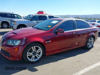 2009 Pontiac G8 with VIN 6G2ER57749L181327, listed as a IAAI auction lot 40772434 with 251,047 mi miles. Bid and sale history available at carsss.com. Image 2.