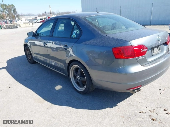 2014 Volkswagen Jetta Sedan S with VIN 3VW2K7AJ1EM329682, listed as a IAAI auction lot 41715820 with 182,782 mi miles. Bid and sale history available at carsss.com. Image 3.