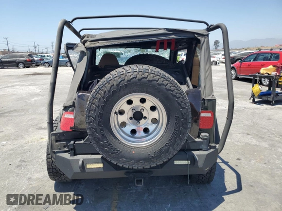 1997 Jeep Wrangler SE with VIN 1J4FY29P2VP438901, listed as a Copart auction lot 63812924 with 0 mi miles and Salvage Title. Bid and sale history available at carsss.com. Image 6.
