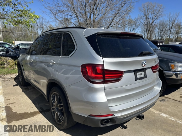 2015 BMW X5 xDrive35i with VIN 5UXKR0C57F0P14432, listed as a IAAI auction lot 42076389 with 119,109 mi miles. Bid and sale history available at carsss.com. Image 3.