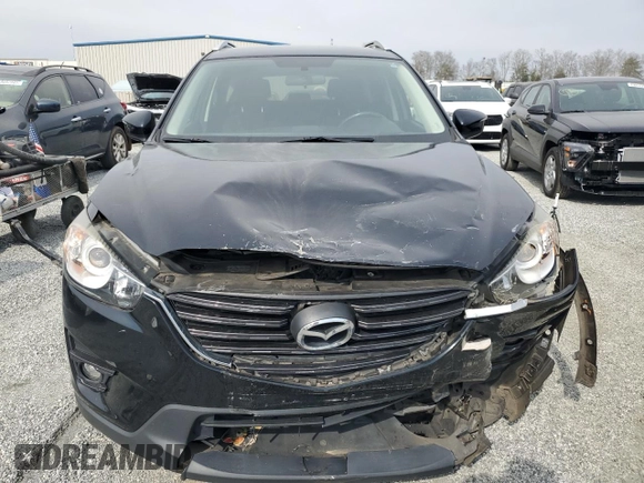 2016 Mazda CX-5 Touring with VIN JM3KE2CY1G0654434, listed as a Copart auction lot 48974115 with 83,977 mi miles and Salvage Title. Bid and sale history available at carsss.com. Image 5.