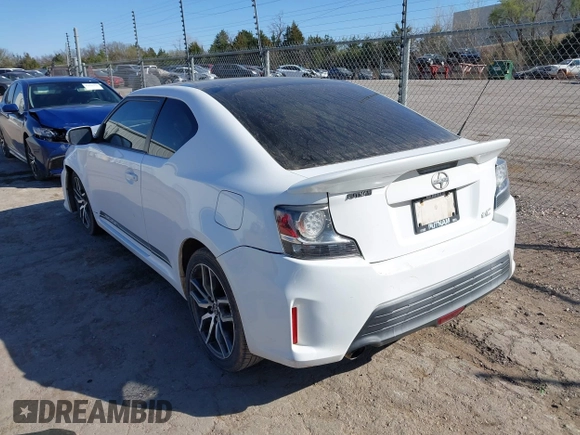 2014 Scion tC z VIN JTKJF5C74E3072410, wystawiony jako IAAI lot #41810965 z przebiegiem 147 164 mil mil oraz . Historia ofert i sprzedaży dostępna na DreamBid. Obrazek 3.