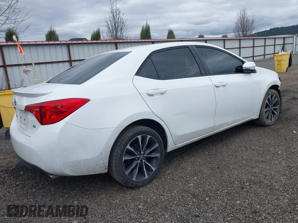 2019 Toyota Corolla L with VIN 5YFBURHE1KP937059, listed as a IAAI auction lot 41901278 with 98,796 mi miles and . Bid and sale history available at DreamBid. Image 4.
