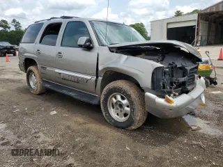 2002 GMC Yukon SLT z VIN 1GKEC13Z22R158811, wystawiony jako Copart lot #74568464 z przebiegiem Nie podano mil oraz Szkoda całkowita • Salvage title. Historia ofert i sprzedaży dostępna na DreamBid. Obrazek 4.