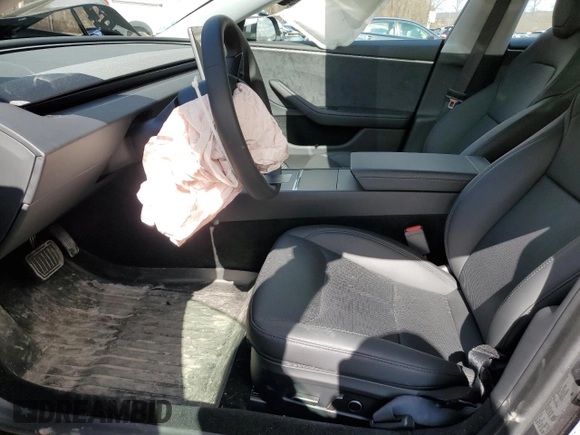 2025 Tesla Model 3 Long Range with VIN 5YJ3E1EB6SF921092, listed as a Copart auction lot 46918025 with 1,403 mi miles and Salvage Title. Bid and sale history available at DreamBid. Image 7.
