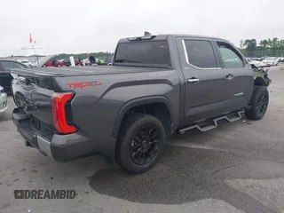 2022 Toyota Tundra Limited with VIN 5TFJA5AB5NX010780, listed as a IAAI auction lot 42446780 with 47,114 mi miles and . Bid and sale history available at DreamBid. Image 4.