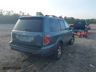 2006 Honda Pilot EX-L with VIN 5FNYF18516B002860, listed as a IAAI auction lot 41963343 with 202,799 mi miles. Bid and sale history available at carsss.com. Image 4.