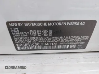 2020 BMW 3 Series 330i with VIN WBA5R1C06LFH40375, listed as a IAAI auction lot 41023872 with 98,325 mi miles and . Bid and sale history available at carsss.com. Image 9.
