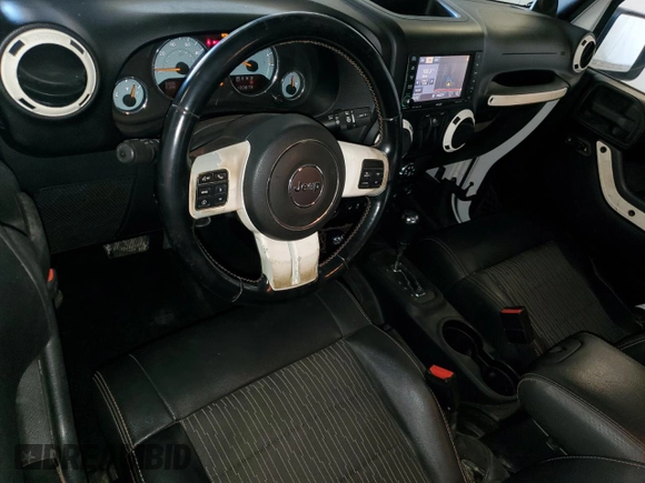 2012 Jeep Wrangler Arctic with VIN 1C4AJWBG4CL146788, listed as a Copart auction lot 75648234 with 100,879 mi miles and Clean title. Bid and sale history available at DreamBid. Image 8.