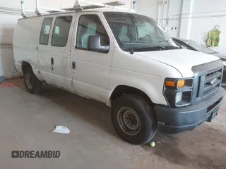 2011 Ford Econoline Cargo Commercial with VIN 1FTNE2EW9BDB11058, listed as a IAAI auction lot 42202069 with 282,179 mi miles. Bid and sale history available at carsss.com. Image 1.