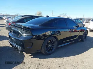 2020 Dodge Charger Scat Pack z VIN 2C3CDXGJ5LH162266, wystawiony jako IAAI lot #41763759 z przebiegiem 83 366 mil mil oraz . Historia ofert i sprzedaży dostępna na DreamBid. Obrazek 4.