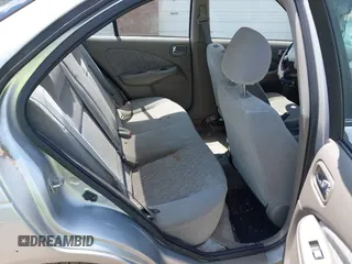 2003 Nissan Sentra XE z VIN 3N1CB51D43L714603, wystawiony jako IAAI lot #42392644 z przebiegiem 201 656 mil mil oraz . Historia ofert i sprzedaży dostępna na DreamBid. Obrazek 8.