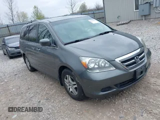 2007 Honda Odyssey EX-L with VIN 5FNRL38627B413638, listed as a IAAI auction lot 41960963 with 172,968 mi miles. Bid and sale history available at carsss.com. Image 1.