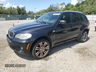 2012 BMW X5 35i z VIN 5UXZV4C54CL744502, wystawiony jako Copart lot #57828115 z przebiegiem 161 597 mil mil oraz Czysty tytuł • Clean title. Historia ofert i sprzedaży dostępna na DreamBid. Obrazek 1.