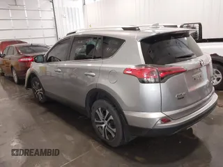 2016 Toyota RAV4 LE with VIN 2T3BFREV7GW450556, listed as a IAAI auction lot 41815720 with 106,734 mi miles. Bid and sale history available at carsss.com. Image 3.