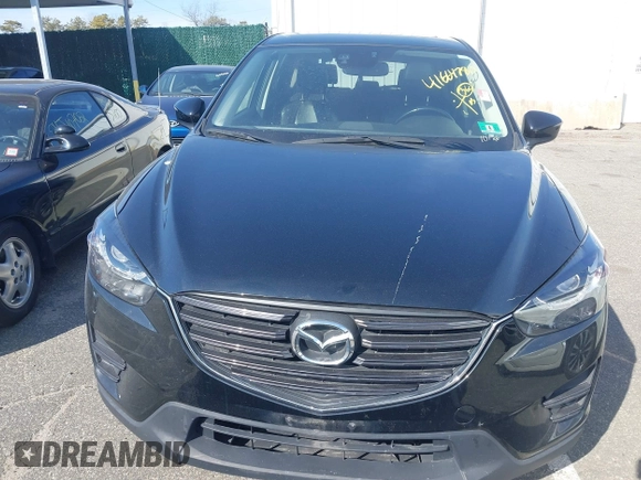 2016 Mazda CX-5 Grand Touring with VIN JM3KE4DY5G0681436, listed as a IAAI auction lot 41664780 with 172,199 mi miles. Bid and sale history available at carsss.com. Image 6.