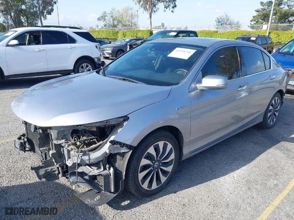 2017 Honda Accord Hybrid EX-L with VIN JHMCR6F5XHC004090, listed as a IAAI auction lot 41934241 with 241,638 mi miles. Bid and sale history available at carsss.com. Image 2.