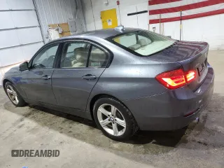 2015 BMW 3 Series 320i xDrive with VIN WBA3C3C52FP664472, listed as a Copart auction lot 55647585 with 129,934 mi miles and Salvage title. Bid and sale history available at DreamBid. Image 2.
