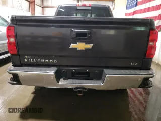 2014 Chevrolet Silverado 1500 LTZ with VIN 1GCVKSEC0EZ377719, listed as a Copart auction lot 52186575 with 62,580 mi miles and Salvage Title. Bid and sale history available at DreamBid. Image 6.
