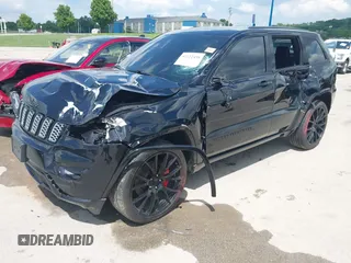 2021 Jeep Grand Cherokee Laredo X with VIN 1C4RJFAG2MC516111, listed as a IAAI auction lot 42222439 with 60,888 mi miles and . Bid and sale history available at DreamBid. Image 19.