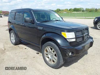 2011 Dodge Nitro Heat with VIN 1D4PU4GX9BW607580, listed as a IAAI auction lot 42105529 with 143,795 mi miles. Bid and sale history available at carsss.com. Image 1.